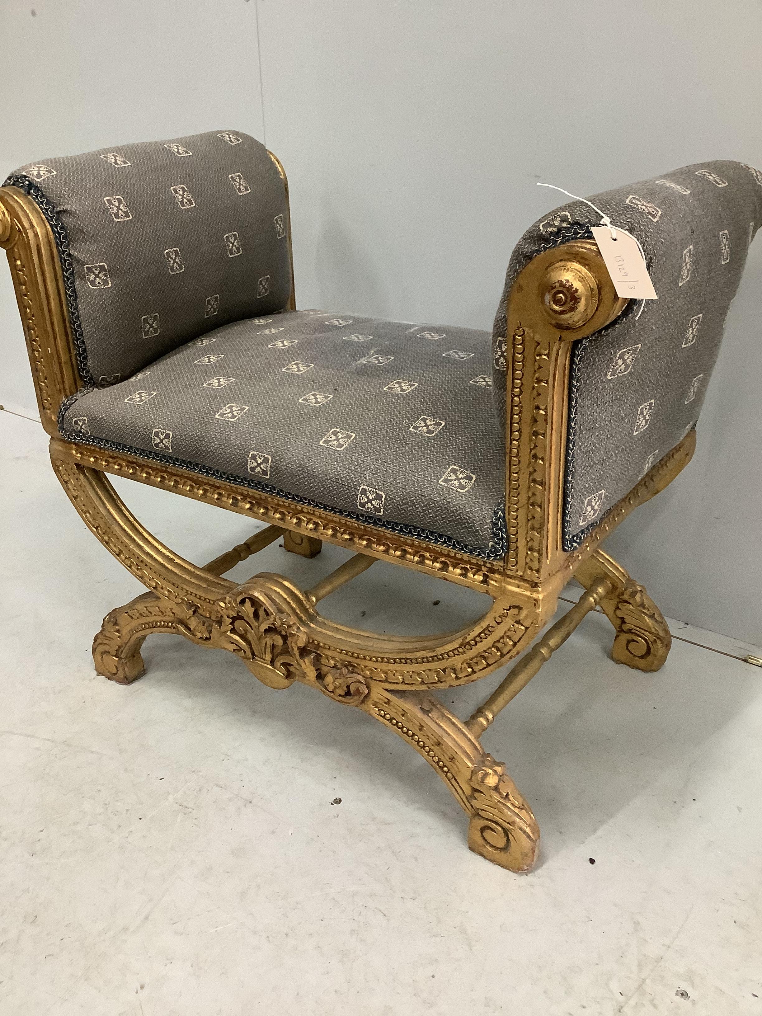 An 18th century style giltwood and composition X frame stool, width 82cm, depth 50cm, height 72cm